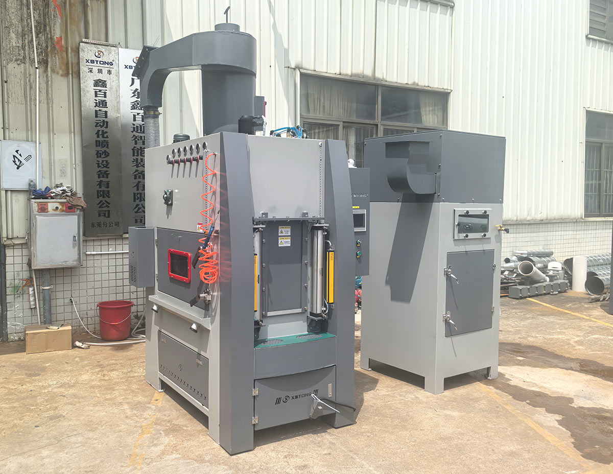 鑫百通转盘式自动喷砂机设备实拍图片